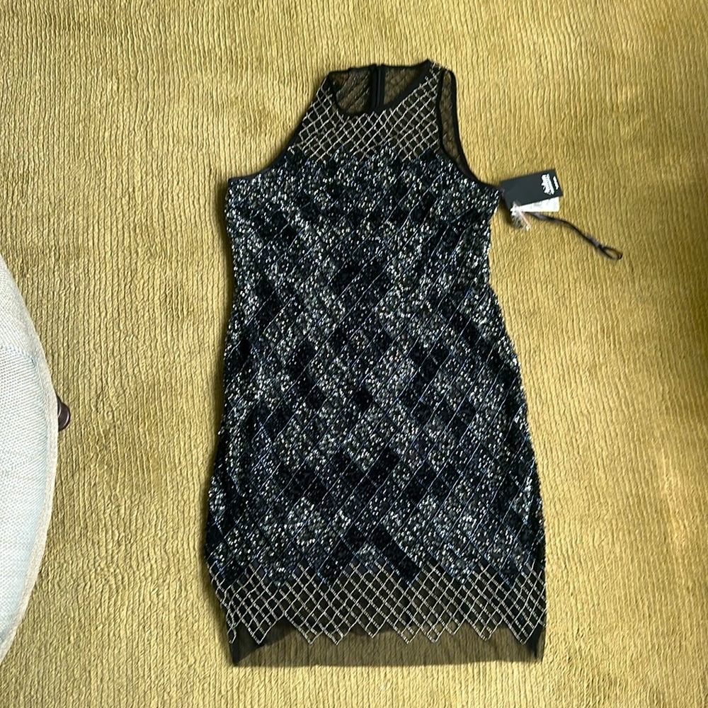 Aidan Mattox black beaded halter mini dress. Never worn, new with tags.